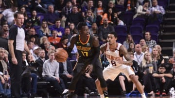 PHOENIX, AZ - JANUARY 2: Dennis Schroder #17 of the Atlanta Hawks handles the ball against Tyler Ulis #8 of the Phoenix Suns on January 2, 2018 at Talking Stick Resort Arena in Phoenix, Arizona. NOTE TO USER: User expressly acknowledges and agrees that, by downloading and or using this photograph, user is consenting to the terms and conditions of the Getty Images License Agreement. Mandatory Copyright Notice: Copyright 2018 NBAE (Photo by Michael Gonzales/NBAE via Getty Images)