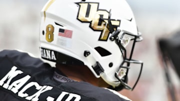 ORLANDO, FLORIDA - DECEMBER 01: Darriel Mack Jr. #8 of the UCF Knights runs out of the locker room before the American Athletic Championship against the Memphis Tigers at Spectrum Stadium on December 01, 2018 in Orlando, Florida. (Photo by Julio Aguilar/Getty Images)