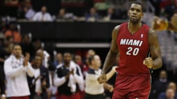 Jan 15, 2014; Washington, DC, USA; Miami Heat center Greg Oden (20) runs down the court after scoring against the Washington Wizards Girls in the second quarter at Verizon Center. The Wizards won 114-97. Mandatory Credit: Geoff Burke-USA TODAY Sports