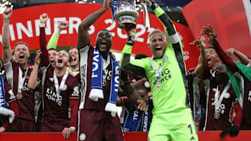 Leicester City's English-born Jamaican defender Wes Morgan (L) and Danish goalkeeper Kasper Schmeichel (R) (Photo by NICK POTTS/POOL/AFP via Getty Images)