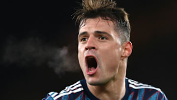 WOLVERHAMPTON, ENGLAND - FEBRUARY 10: Granit Xhaka of Arsenal celebrates following their side's victory in the Premier League match between Wolverhampton Wanderers and Arsenal at Molineux on February 10, 2022 in Wolverhampton, England. (Photo by Shaun Botterill/Getty Images)