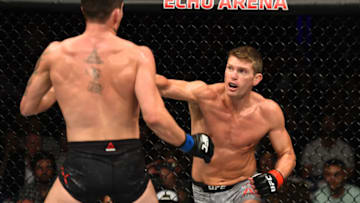 LIVERPOOL, ENGLAND - MAY 27: (R-L) Stephen Thompson punches Darren Till of England in their welterweight bout during the UFC Fight Night event at ECHO Arena on May 27, 2018 in Liverpool, England. (Photo by Josh Hedges/Zuffa LLC/Zuffa LLC via Getty Images)