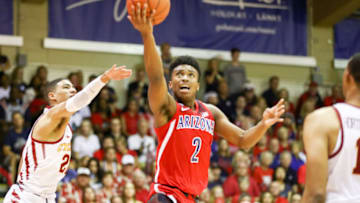 LAHAINA, HI - NOVEMBER 19: Brandon Williams #2 of the Arizona Wildcats drives the lane and splits the Iowa State Cyclones defense during the second half of the game at Lahaina Civic Center on November 19, 2018 in Lahaina, Hawaii. (Photo by Darryl Oumi/Getty Images)