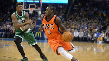 Nov 15, 2015; Oklahoma City, OK, USA; Oklahoma City Thunder guard Dion Waiters (3) moves to the basket in front of Boston Celtics guard Marcus Smart (36) during the first quarter at Chesapeake Energy Arena. Mandatory Credit: Mark D. Smith-USA TODAY Sports