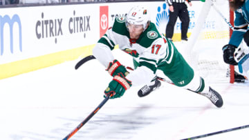 SAN JOSE, CA - NOVEMBER 06: Minnesota Wild left wing Marcus Foligno (17) dives for a loose puck during the San Jose Sharks game versus the Minnesota Wild on November 6, 2018, at SAP Center in San Jose, CA (Photo by Matt Cohen/Icon Sportswire via Getty Images)