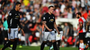SOUTHAMPTON, ENGLAND - SEPTEMBER 23: Phil Jones (C) and Chris Smalling (L) of Manchester United celeberate their victory in the Premier League match between Southampton and Manchester United at St Mary's Stadium on September 23, 2017 in Southampton, England. (Photo by Dan Mullan/Getty Images)