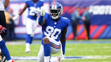 Sep 18, 2016; East Rutherford, NJ, USA; New York Giants defensive end Jason Pierre-Paul (90) celebrates a sack of New Orleans Saints quarterback Drew Brees (9) during the first half at MetLife Stadium. Mandatory Credit: Ed Mulholland-USA TODAY Sports