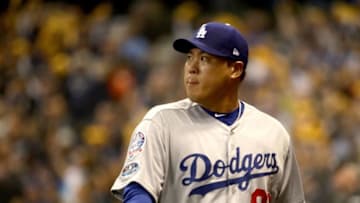 MILWAUKEE, WI - OCTOBER 19: Hyun-Jin Ryu #99 of the Los Angeles Dodgers reacts against the Milwaukee Brewers during the first inning in Game Six of the National League Championship Series at Miller Park on October 19, 2018 in Milwaukee, Wisconsin. (Photo by Jonathan Daniel/Getty Images)