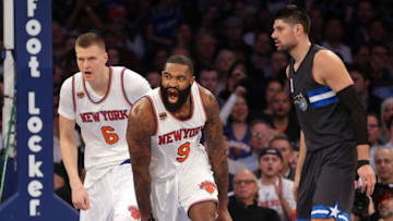 Dec 22, 2016; New York, NY, USA; New York Knicks center Kyle O'Quinn (9) reacts after a dunk against the Orlando Magic during the second quarter at Madison Square Garden. Mandatory Credit: Brad Penner-USA TODAY Sports