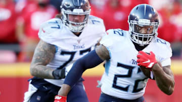 KANSAS CITY, MISSOURI - JANUARY 19: Derrick Henry #22 of the Tennessee Titans runs with the ball in the first half against the Kansas City Chiefs in the AFC Championship Game at Arrowhead Stadium on January 19, 2020 in Kansas City, Missouri. (Photo by Jamie Squire/Getty Images)