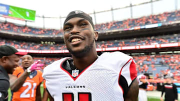 Oct 9, 2016; Denver, CO, USA; Atlanta Falcons wide receiver Julio Jones (11) celebrates the win over the Denver Broncos in the second half at Sports Authority Field at Mile High. The Falcons defeated the Broncos 23-16. Mandatory Credit: Ron Chenoy-USA TODAY Sports