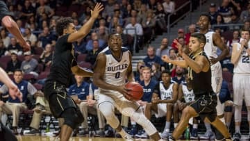 Nov 24, 2016; Las Vegas, NV, USA; Butler Bulldogs guard Avery Woodson (0) goes betweenVanderbilt Commodores guard Payton Willis (1) and Vanderbilt Commodores guard Nolan Cressler (24) during the second half at Orleans Arena. Butler won 76-66. Mandatory Credit: Joshua Dahl-USA TODAY Sports