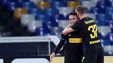 NAPLES, ITALY - JANUARY 06: Lautaro Martínez of FC Internazionale celebrates after scoring his goal 1-3 with his team mate Milan Skriniar during the Serie A match between SSC Napoli and FC Internazionale at Stadio San Paolo on January 6, 2020 in Naples, Italy. (Photo by MB Media/Getty Images)