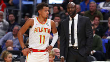 DETROIT, MICHIGAN - OCTOBER 24: Trae Young #11 of the Atlanta Hawks talks with head coach Lloyd Pierce while playing the Detroit Pistons at Little Caesars Arena on October 24, 2019 in Detroit, Michigan. NOTE TO USER: User expressly acknowledges and agrees that, by downloading and/or using this photograph, user is consenting to the terms and conditions of the Getty Images License Agreement. (Photo by Gregory Shamus/Getty Images) (Photo by Gregory Shamus/Getty Images)