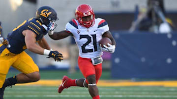 BERKELEY, CA - OCTOBER 21: J.J. Taylor #21 of the Arizona Wildcats carries the ball against the California Golden Bears during their NCAA football game at California Memorial Stadium on October 21, 2017 in Berkeley, California. (Photo by Thearon W. Henderson/Getty Images)