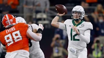 ARLINGTON, TX - DECEMBER 4: Blake Shapen #12 of the Baylor Bears looks to throw against the Oklahoma State Cowboys in the first half of the Big 12 Football Championship at AT&T Stadium on December 4, 2021 in Arlington, Texas. (Photo by Ron Jenkins/Getty Images)