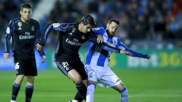 LEGANES, SPAIN - APRIL 05: Alvaro Morata (L) of Real Madrid CF competes for the ball with Roberto Roman Triguero alias Tito (R) of Deportivo Leganes during the La Liga match between CD Leganes and Real Madrid CF at Estadio Municipal de Butarque on April 5, 2017 in Leganes, Spain. (Photo by Gonzalo Arroyo Moreno/Getty Images)