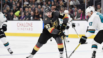 LAS VEGAS, NV - NOVEMBER 24: David Perron #57 of the Vegas Golden Knights passes the puck with Joakim Ryan #47 of the San Jose Sharks defending during the game at T-Mobile Arena on November 24, 2017 in Las Vegas, Nevada. (Photo by Jeff Bottari/NHLI via Getty Images)