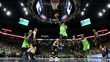 MINNEAPOLIS, MN - DECEMBER 16: Jeff Teague #0 of the Minnesota Timberwolves goes to the basket against the Phoenix Suns on December 16, 2017 at Target Center in Minneapolis, Minnesota. NOTE TO USER: User expressly acknowledges and agrees that, by downloading and or using this Photograph, user is consenting to the terms and conditions of the Getty Images License Agreement. Mandatory Copyright Notice: Copyright 2017 NBAE (Photo by Jordan Johnson/NBAE via Getty Images)