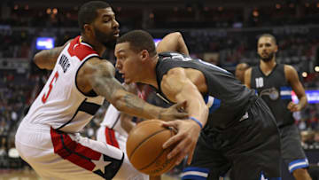 WASHINGTON, DC - MARCH 05: Aaron Gordon #00 of the Orlando Magic dribbles past Markieff Morris #5 of the Washington Wizards during the first half at Verizon Center on March 5, 2017 in Washington, DC. NOTE TO USER: User expressly acknowledges and agrees that, by downloading and or using this photograph, User is consenting to the terms and conditions of the Getty Images License Agreement. (Photo by Patrick Smith/Getty Images)