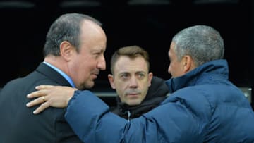 NEWCASTLE UPON TYNE, ENGLAND - DECEMBER 30: Rafael Benitez, Manager of Newcastle United greets Chris Hughton, Manager of Brighton and Hove Albion prior to the Premier League match between Newcastle United and Brighton and Hove Albion at St. James' Park on December 30, 2017 in Newcastle upon Tyne, England. (Photo by Mark Runnacles/Getty Images)