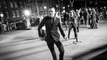 LONDON, ENGLAND - DECEMBER 04: (EDITORS NOTE: Image has been converted to black and white.) MMA Fighter Conor McGregor walks the red carpet during The Fashion Awards 2017 in partnership with Swarovski at Royal Albert Hall on December 4, 2017 in London, England. (Photo by Gareth Cattermole/BFC/Getty Images)