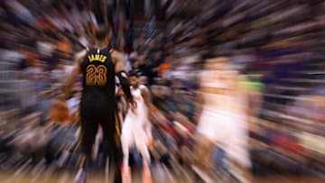 PHOENIX, AZ - MARCH 13: LeBron James #23 of the Cleveland Cavaliers moves the ball down court during the second half of the NBA game against the Phoenix Suns at Talking Stick Resort Arena on March 13, 2018 in Phoenix, Arizona. The Cavaliers defeated the Suns 129-107. NOTE TO USER: User expressly acknowledges and agrees that, by downloading and or using this photograph, User is consenting to the terms and conditions of the Getty Images License Agreement. (Photo by Christian Petersen/Getty Images)