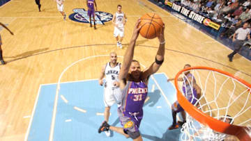 SALT LAKE CITY - April 14: Shawn Marion #31 of the Phoenix Suns dunks as Carlos Boozer #5 and the Utah Jazz watch on April 14, 2007 at the EnergySolutions Arena in Salt Lake City, Utah. NOTICE TO USER: User expressly acknowledges and agrees that, by downloading and or using this Photograph, user is consenting to the terms and conditions of the Getty Images License Agreement. Mandatory Copyright Note: Copyright 2007 NBAE (Photo by Melissa Majchrzak/NBAE via Getty Images)
