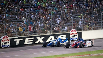 Jun 6, 2015; Fort Worth, TX, USA; IndyCar Series driver Tristan Vautier (19) and Takuma Sato (14) during the Firestone 600 at Texas Motor Speedway. Mandatory Credit: Jerome Miron-USA TODAY Sports