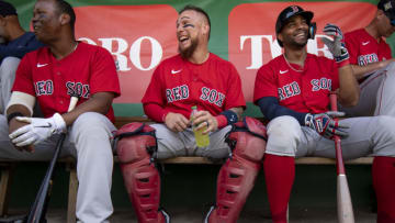 Rafael Devers #11, Christian Vazquez #7, and Xander Bogaerts #2 of the Boston Red Sox (Photo by Billie Weiss/Boston Red Sox/Getty Images)