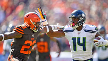 CLEVELAND, OHIO - OCTOBER 13: Damarious Randall #23 of the Cleveland Browns tries to stop D.K. Metcalf #14 of the Seattle Seahawks at FirstEnergy Stadium on October 13, 2019 in Cleveland, Ohio. (Photo by Jason Miller/Getty Images)
