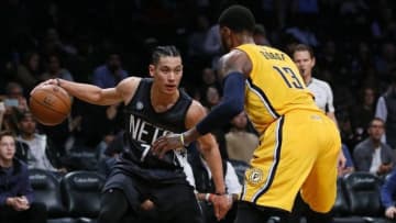 Oct 28, 2016; Brooklyn, NY, USA; Indiana Pacers forward Paul George (13) defends against Brooklyn Nets guard Jeremy Lin (7) during second half at Barclays Center. The Brooklyn Nets defeated the Indiana Pacers 103-94.Mandatory Credit: Noah K. Murray-USA TODAY Sports