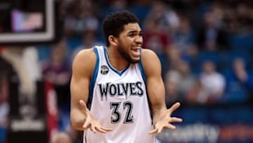 Mar 30, 2016; Minneapolis, MN, USA; Minnesota Timberwolves center Karl-Anthony Towns (32) complains to a referee in the second quarter against the Los Angeles Clippers at Target Center. Mandatory Credit: Brad Rempel-USA TODAY Sports