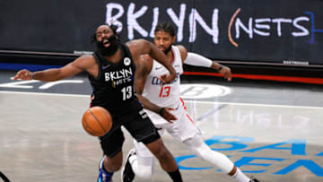 NEW YORK, NEW YORK - FEBRUARY 02: James Harden #13 of the Brooklyn Nets reacts as Paul George #13 of the LA Clippers knocks the ball away during the first half at Barclays Center on February 02, 2021 in the Brooklyn borough of New York City. NOTE TO USER: User expressly acknowledges and agrees that, by downloading and or using this Photograph, user is consenting to the terms and conditions of the Getty Images License Agreement. (Photo by Sarah Stier/Getty Images)