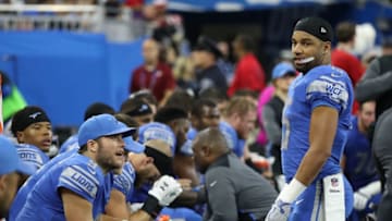 Detroit Lions players on the sideline at Ford Field. (Photo by Leon Halip/Getty Images)