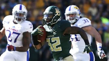Nov 1, 2014; Waco, TX, USA; Baylor Bears running back Shock Linwood (32) runs the ball against the Kansas Jayhawks in the first quarter at McLane Stadium. Mandatory Credit: Tim Heitman-USA TODAY Sports