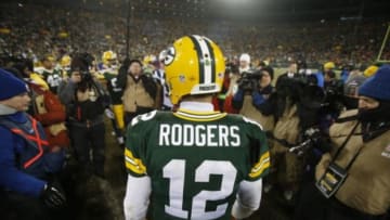 Nov 30, 2014; Green Bay, WI, USA; Green Bay Packers quarterback Aaron Rodgers (12) after the game against the New England Patriots at Lambeau Field. The Packers won 26-21. Mandatory Credit: Chris Humphreys-USA TODAY Sports