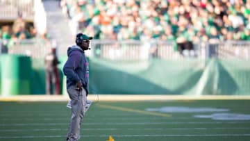 Head coach Corey Chamblin of the Saskatchewan Roughriders throws the challenge flag in a game between the Edmonton Eskimos and Saskatchewan Roughriders in week 17 of the 2014 CFL season at Mosaic Stadium on October 19, 2014 in Regina, Saskatchewan, Canada. (Photo by Brent Just/Getty Images)