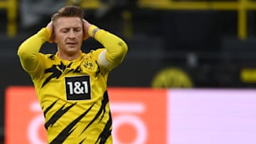 Marco Reus reacts during the German first division Bundesliga football match between BVB Borussia Dortmund and 1 FSV Mainz 05 in Dortmund, western Germany, on January 16, 2021. (Photo by Ina Fassbender / POOL / AFP) / DFL REGULATIONS PROHIBIT ANY USE OF PHOTOGRAPHS AS IMAGE SEQUENCES AND/OR QUASI-VIDEO (Photo by INA FASSBENDER/POOL/AFP via Getty Images)