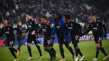 (From L) Juventus' Italian forward Marco Da Graca, Juventus' Spanish forward Alvaro Morata, Juventus' Brazilian defender Alex Sandro, Juventus' Italian forward Moise Kean, Juventus' Colombian midfielder Juan Cuadrado and Juventus' Brazilian midfielder Arthur acknowledges the public at the end of the UEFA Champions League Group H football match between Juventus and uringMalmo on December 8, 2021 at the Juventus stadium in Turin. (Photo by Marco BERTORELLO / AFP) (Photo by MARCO BERTORELLO/AFP via Getty Images)