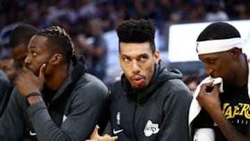 SAN FRANCISCO, CALIFORNIA - OCTOBER 05: Rajon Rondo #9 (right) watches Danny Green #14 of the Los Angeles Lakers eat a sandwich on the bench during their game against the Golden State Warriors at Chase Center on October 05, 2019 in San Francisco, California. NOTE TO USER: User expressly acknowledges and agrees that, by downloading and or using this photograph, User is consenting to the terms and conditions of the Getty Images License Agreement. (Photo by Ezra Shaw/Getty Images)