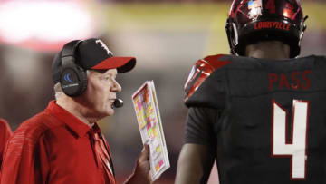 LOUISVILLE, KY - OCTOBER 05: Head coach Bobby Petrino of the Louisville Cardinals talks to Jawon Pass #4 in the first half of the game against the Georgia Tech Yellow Jackets at Cardinal Stadium on October 5, 2018 in Louisville, Kentucky. (Photo by Joe Robbins/Getty Images)