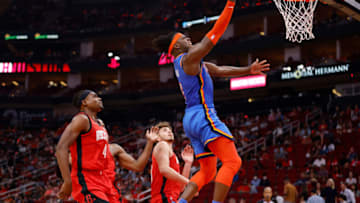 Luguentz Dort #5 of the Oklahoma City Thunder goes up for a lay up in the second half against the Houston Rockets at Toyota Center on October 22, 2021 in Houston, Texas. NOTE TO USER: User expressly acknowledges and agrees that, by downloading and or using this photograph, User is consenting to the terms and conditions of the Getty Images License Agreement. (Photo by Tim Warner/Getty Images)