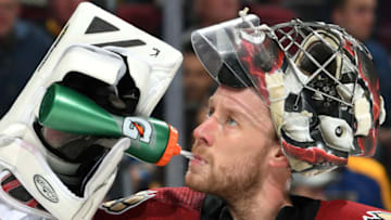 GLENDALE, ARIZONA - DECEMBER 31: Goalie Antti Raanta #32 of the Arizona Coyotes drinks from a water bottle during the third period of the NHL hockey game against the St Louis Blues at Gila River Arena on December 31, 2019 in Glendale, Arizona. (Photo by Norm Hall/NHLI via Getty Images)