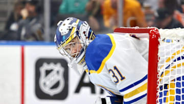 EDMONTON, CANADA OCTOBER 18: Eric Comrie #31 of the Buffalo Sabres looks on during a game against the Edmonton Oilers on October 18, 2022 at Rogers Place in Edmonton, Alberta, Canada. (Photo by Lawrence Scott/Getty Images)