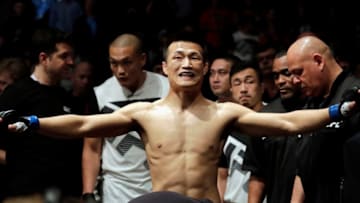 HOUSTON, TX - FEBRUARY 04: Chan Sung Jung of South Korea prepares to enter the octagon against Dennis Bermudez of their featherweight bout during the UFC Fight Night event at the Toyota Center on February 4, 2017 in Houston, Texas. (Photo by Tim Warner/Getty Images)