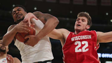 NEW YORK, NY - MARCH 02: Nick Ward #44 of the Michigan State Spartans and Ethan Happ #22 of the Wisconsin Badgers fight for the rebound during quarterfinals of the Big Ten Basketball Tournament at Madison Square Garden on March 2, 2018 in New York City. (Photo by Elsa/Getty Images)