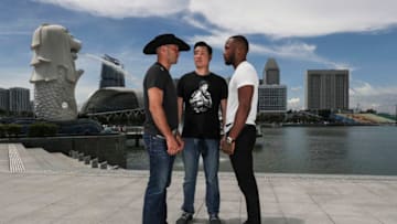 SINGAPORE, SINGAPORE - APRIL 25: (L-R) Donald Cerrone, Kevin Chang, UFC Asia Pacific vice president, and Leon Edwards pose for a photo at the Merlion Park, overlooking Marina Bay, on April 25, 2018 in Singapore. (Photo by Yong Teck Lim/Zuffa LLC)