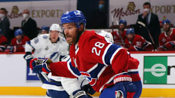 Jon Merrill signed a one-year contract with the Minnesota Wild this summer after playing 49 games between the Detroit Red Wings and Montreal Canadiens last year. (Photo by Bruce Bennett/Getty Images)
