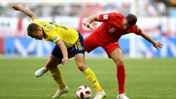 SAMARA, RUSSIA - JULY 07: Viktor Claesson of Sweden battles for possession with Jordan Henderson of England during the 2018 FIFA World Cup Russia Quarter Final match between Sweden and England at Samara Arena on July 7, 2018 in Samara, Russia. (Photo by Ryan Pierse/Getty Images)